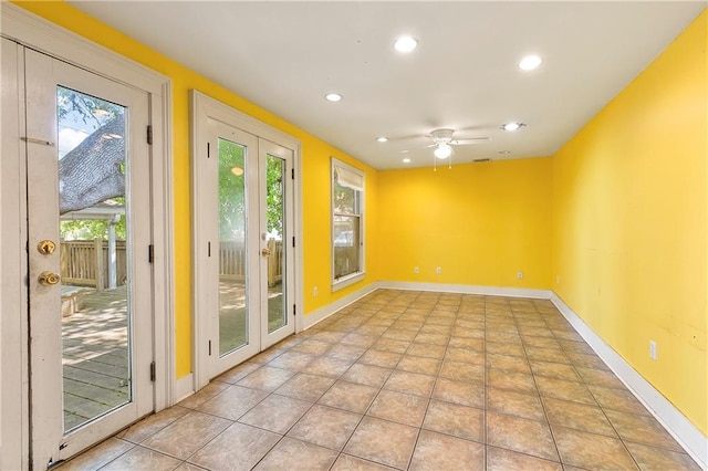 doorway featuring ceiling fan, french doors, and light tile patterned flooring