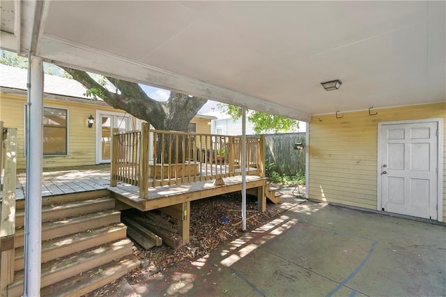 wooden terrace featuring a patio