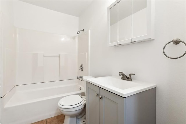 full bathroom featuring toilet, bathtub / shower combination, vanity, and tile patterned floors