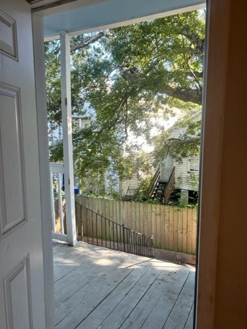 entryway with wood-type flooring