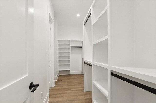 walk in closet featuring light wood-type flooring