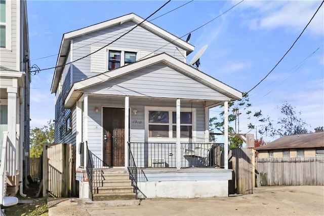 1910B Charbonnet St, New Orleans, LA 70117 - view of front facade featuring covered porch