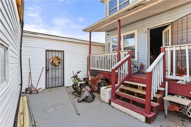 entrance to property with covered porch