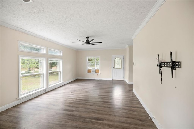 unfurnished living room with cooling unit, crown molding, ceiling fan, a textured ceiling, and dark hardwood / wood-style flooring