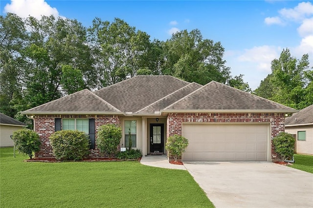 ranch-style house featuring a garage and a front yard