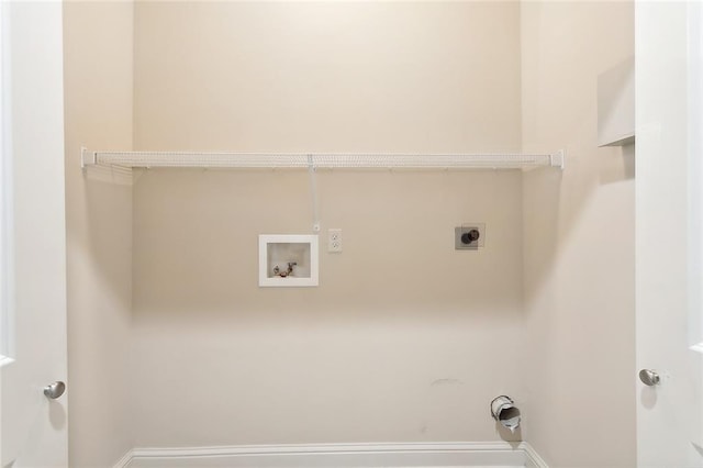 laundry area with washer hookup and electric dryer hookup