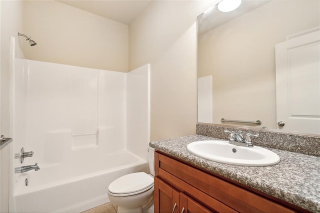 full bathroom with washtub / shower combination, tile patterned floors, vanity, and toilet