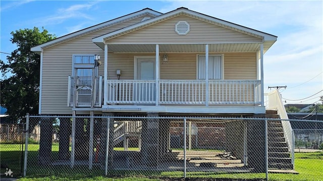 view of front of property featuring covered porch