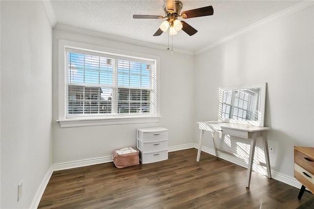 unfurnished office with ceiling fan, dark hardwood / wood-style flooring, a textured ceiling, and ornamental molding