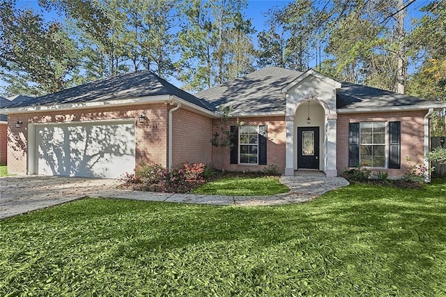 single story home featuring a front yard and a garage