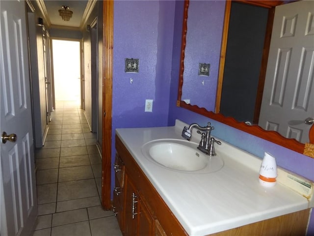 bathroom with tile patterned flooring and vanity