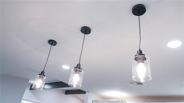 kitchen with ceiling fan, sink, hanging light fixtures, dark hardwood / wood-style flooring, and blue cabinets