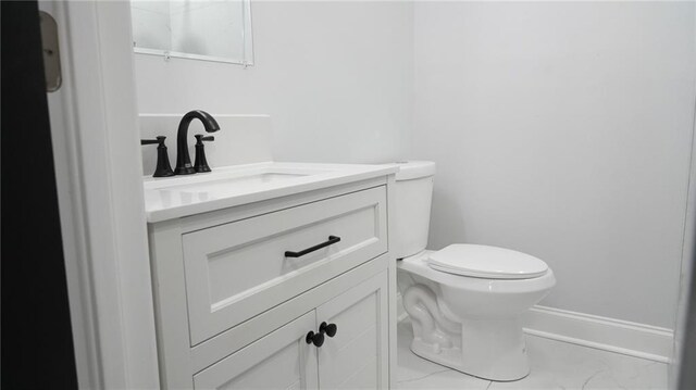 kitchen with white cabinetry, sink, hanging light fixtures, stainless steel gas range oven, and kitchen peninsula