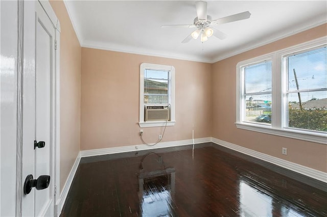 unfurnished room featuring crown molding, plenty of natural light, and dark wood-type flooring