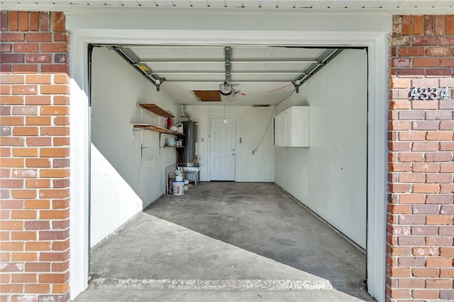 garage featuring water heater