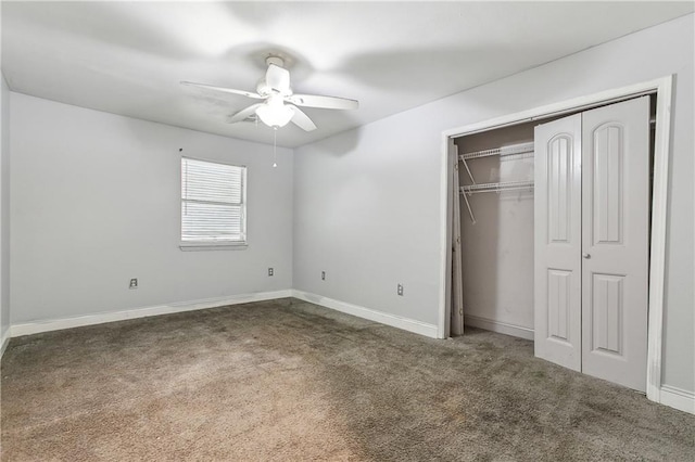 unfurnished bedroom featuring carpet, a closet, and ceiling fan