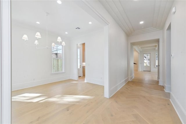 hall featuring ornamental molding and light parquet flooring