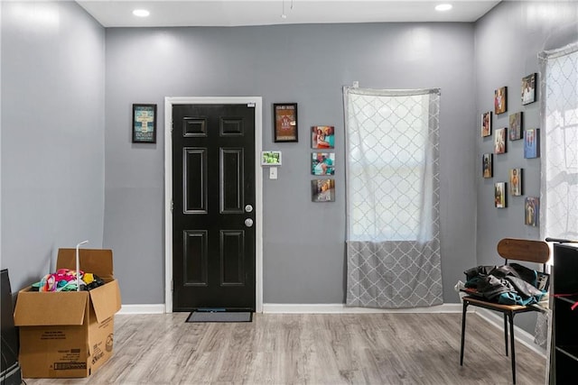 entrance foyer with light wood-type flooring