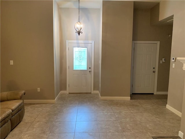 foyer featuring light tile patterned floors