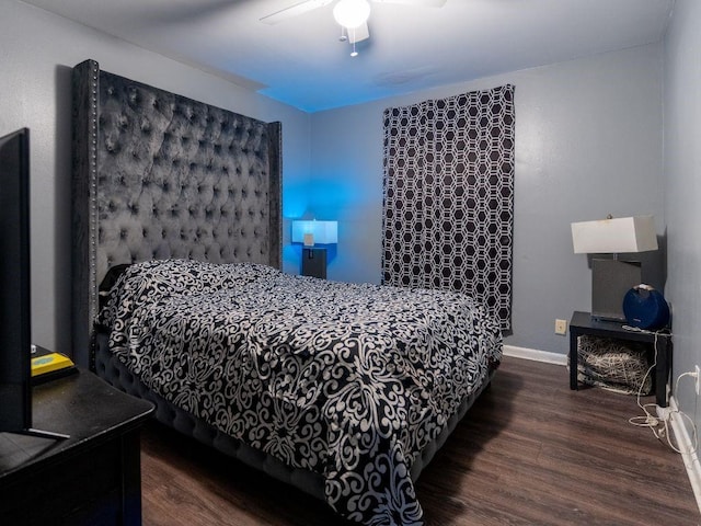 bedroom featuring dark hardwood / wood-style floors and ceiling fan