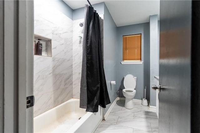 bathroom with shower / bath combo with shower curtain and toilet