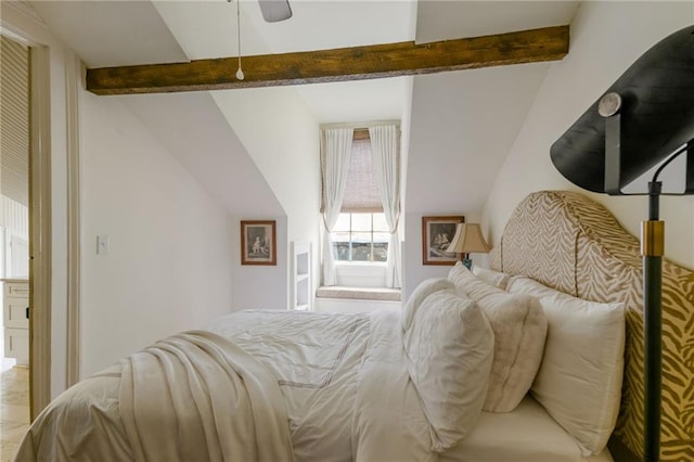 bedroom featuring ceiling fan and lofted ceiling with beams