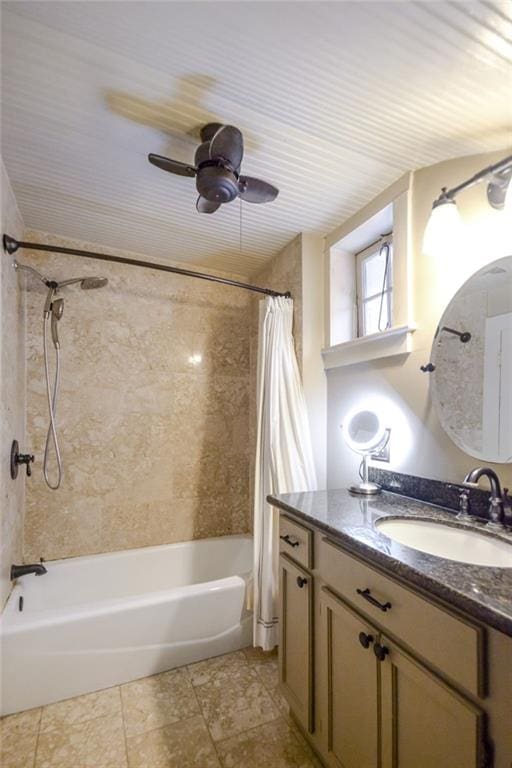 bathroom featuring ceiling fan, vanity, and shower / tub combo