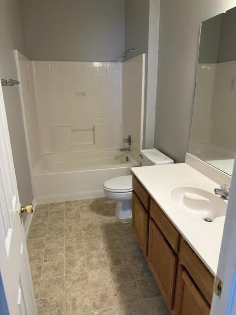 full bathroom featuring tile patterned flooring, vanity, toilet, and tub / shower combination