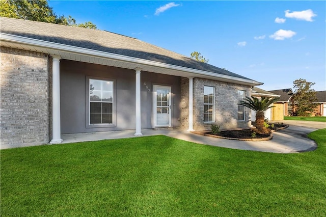 exterior space featuring a yard