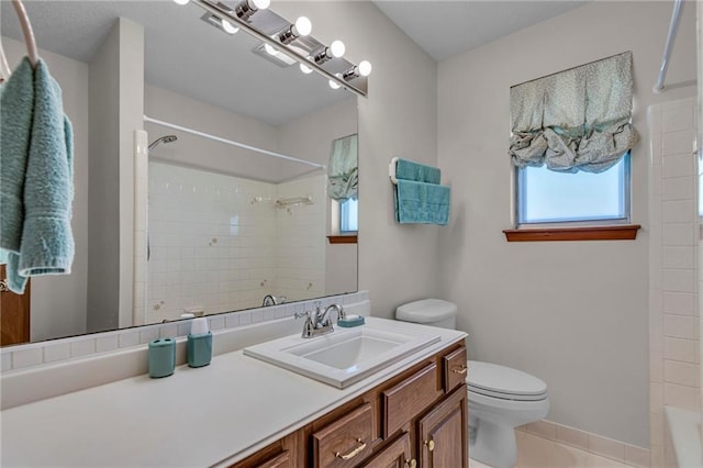 bathroom with tile patterned floors, vanity, and toilet