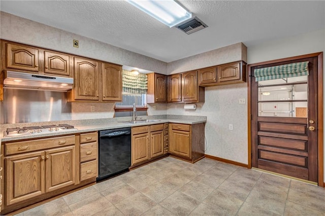 kitchen featuring a textured ceiling, sink, black dishwasher, and stainless steel gas cooktop