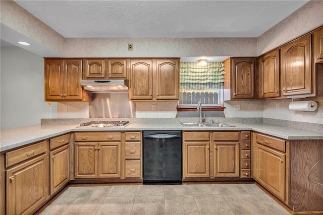 kitchen featuring dishwasher, sink, light tile patterned floors, a textured ceiling, and stainless steel gas cooktop