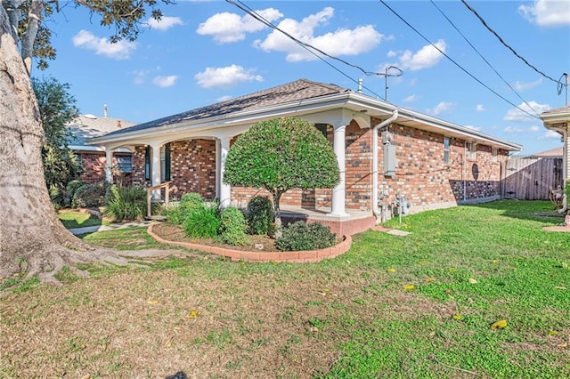 view of property exterior with a lawn