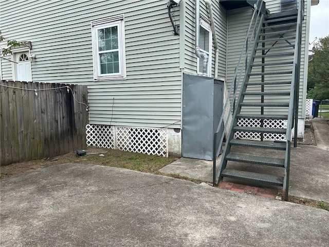 property entrance featuring fence