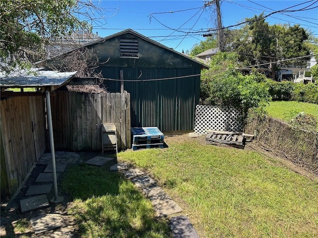 view of outdoor structure featuring fence