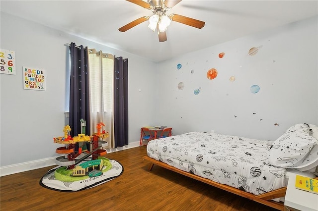 bedroom with hardwood / wood-style flooring and ceiling fan