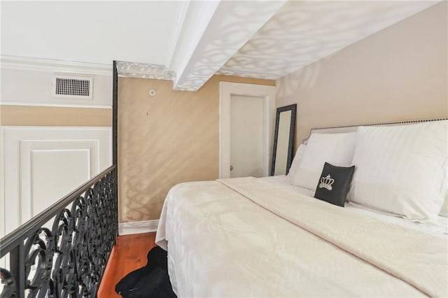 bedroom featuring hardwood / wood-style flooring