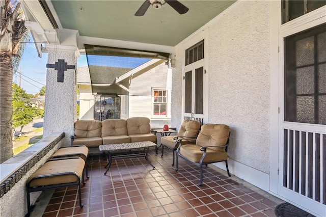 view of patio with ceiling fan and an outdoor hangout area