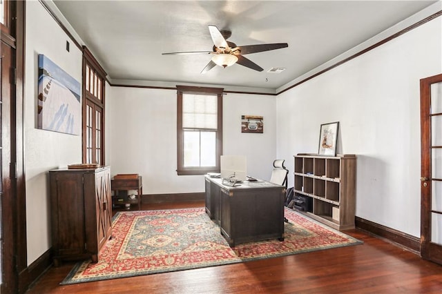 office featuring ceiling fan, dark hardwood / wood-style flooring, crown molding, and french doors