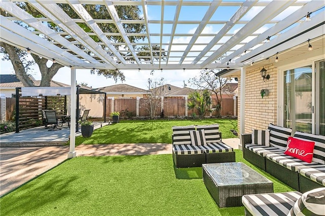 view of yard with a pergola, outdoor lounge area, and a patio