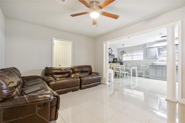 living room featuring ceiling fan and light tile patterned floors