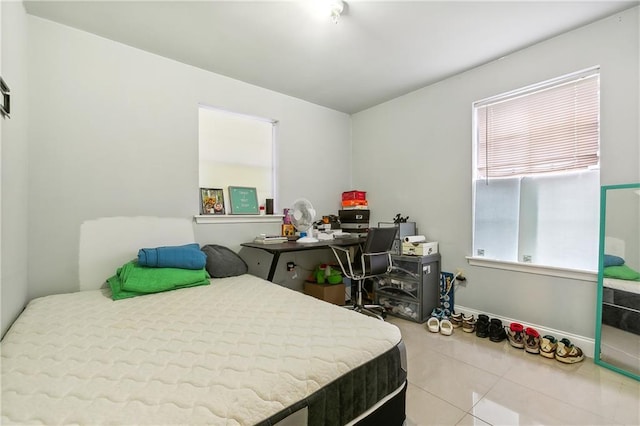 bedroom with tile patterned flooring