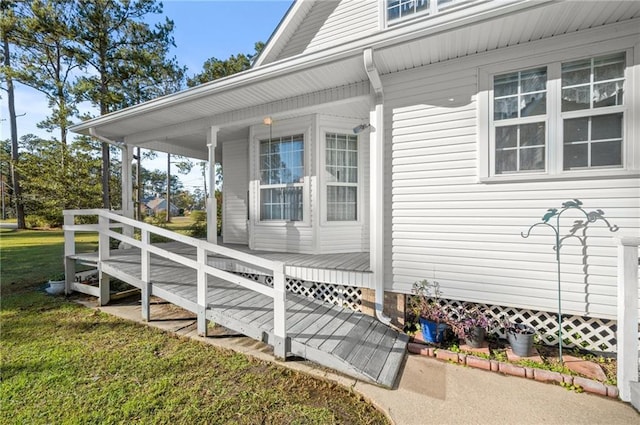 41298 Baytown Rd, Hammond, LA 70403 - view of side of home featuring a lawn and covered porch