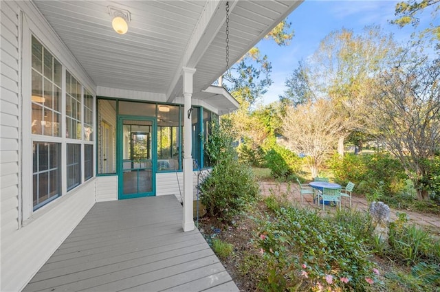41298 Baytown Rd, Hammond, LA 70403 - wooden terrace with a sunroom and outdoor dining space