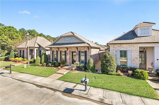 view of front of home with a front yard