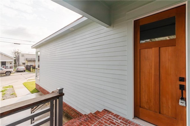 doorway to property with a porch