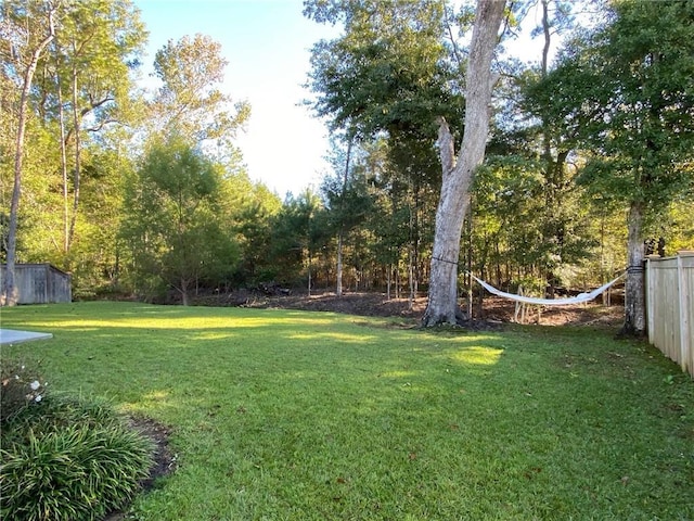 view of yard with fence