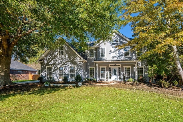 view of front of home featuring a front yard