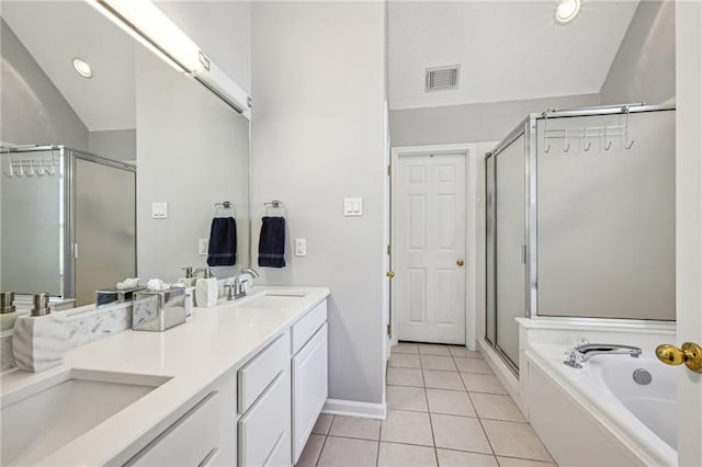 bathroom featuring tile patterned floors, plus walk in shower, vanity, and lofted ceiling