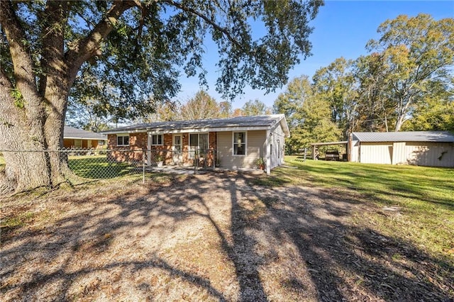 ranch-style home featuring a carport